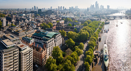 Wide aerial view of central London skyline and the River Thames on a sunny day