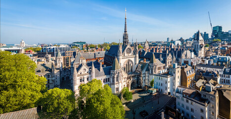 Aerial view of the historic Royal Courts of Justice in London's legal district on a clear day