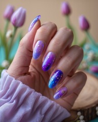 Galactic Nail Art with Purple Flowers and Wooden Base

