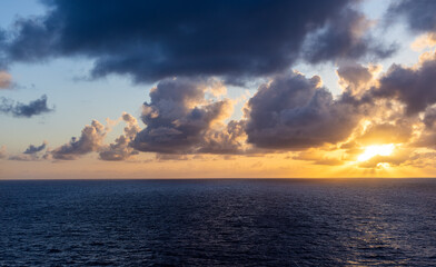 Dramatic Sunrise Over the Ocean With Clouds and Beautiful Light Rays
