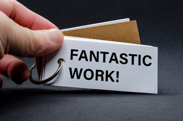 FANTASTIC WORK text on white notepad. A Simple Gesture, A Powerful Message of Recognition and Encouragement