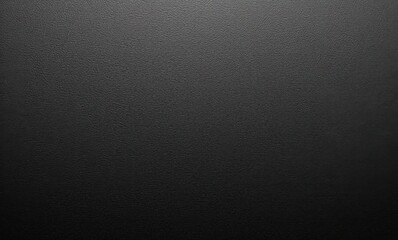 Textured black surface with subtle patterns and a matte finish.