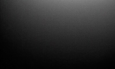 Textured black surface with a subtle pattern, ideal for backgrounds and designs.