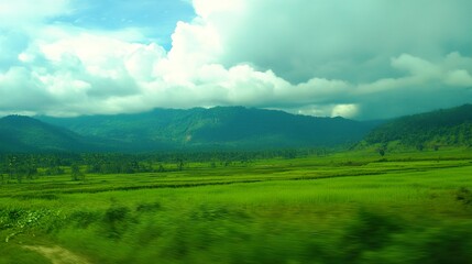 mountain landscape with clouds and sun