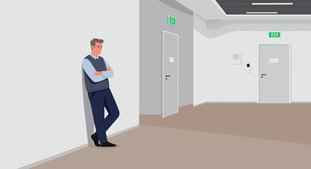 Man leaning against wall in empty hallway with doors  
