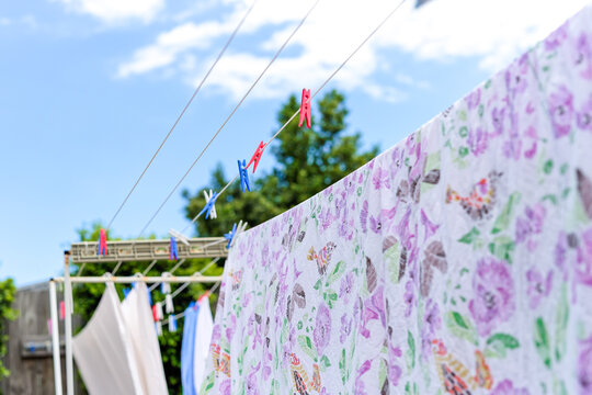 Floral Sheet hanging on the line drying in the sun