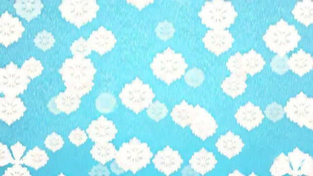 A charming snowflake animation featuring smooth transitions against a bright blue background. The design offers ample space for custom text and creative applications in various projects