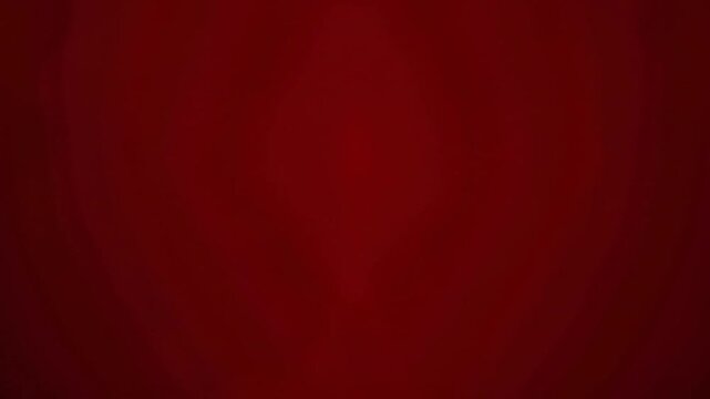 Deep red monochromatic gradient abstract background. Simple uniform red color transition wallpaper. Minimalist dark to light red textureless backdrop.