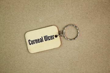 Wooden tag with the word corneal ulcer. Ulcerative keratitis, or simply keratitis, is an...