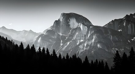 Majestic Black and White Mountainscape with Dramatic Peaks and Trees