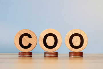 There is notebook with the word COO. It is an abbreviation for Chief Operating Officer as...