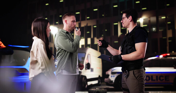 Police Officer Conducts Blood Test