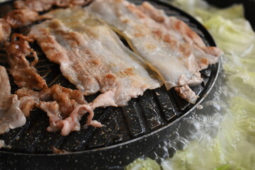 pork barbecue on frying pan, Thai style cuisine