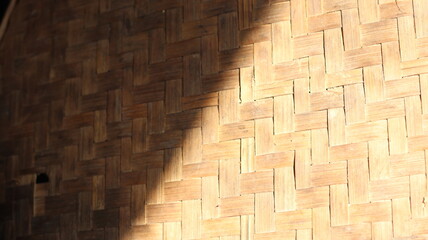 Sunlight Illuminating Woven Bamboo Texture A Natural Background