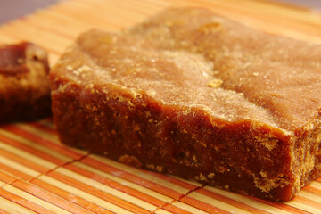 Delicious homemade jaggery on bamboo mat