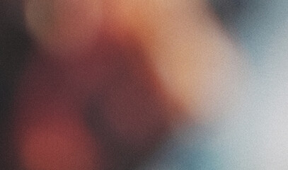 Abstract and visually appealing design with a colorful gradient and blur effect on a grainy texture...