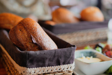 Freshly baked bread rolls served in a cozy restaurant
