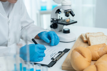 Scientist check chemical and fungus in laboratory. Control experts inspect the concentration of...