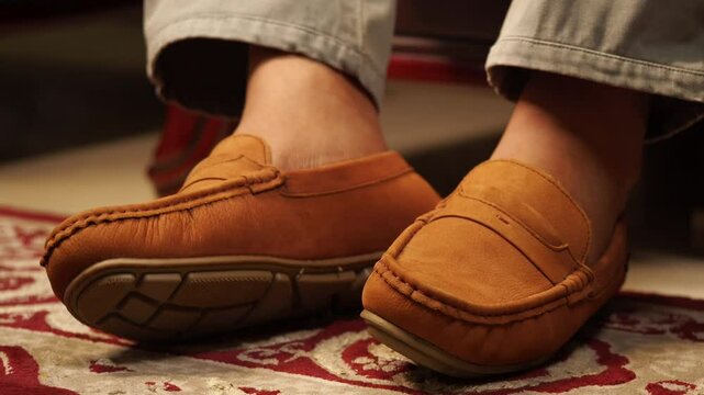 Comfortable loafers showcased on a cozy rug setting