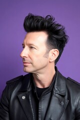 Obraz premium Conceptual art design idea of style for aging men. Purple solid background. Modish men's mid fade haircut - midlife white man with black hair. A joyful man with a trendy and modern hairstyle.