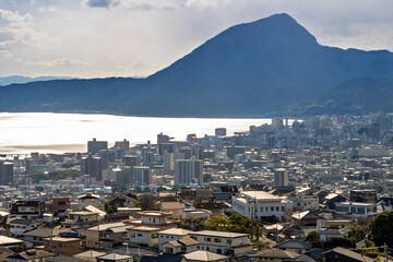 Cityscape view of Beppu city and Beppu bay and Mountain backgrouns, Oita, Kyushu, Japan