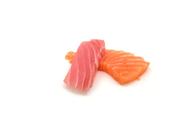 Sashimi made from salmon and tuna on a white background.