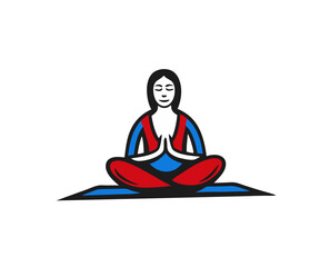 Woman meditating in a cross-legged position on yoga mat  