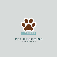 Pet Grooming Logo with Paw and Comb