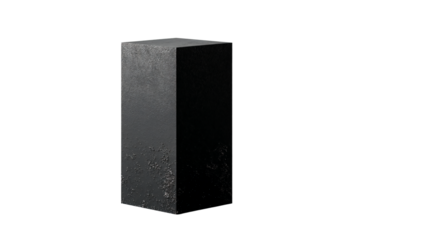 a black block is standing on a white surface