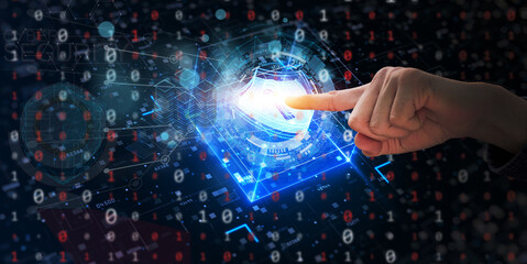 A technological interface comes alive with the touch of a finger, the digit activating a dynamic digital world. Illuminating ideas of innovation and transformation.