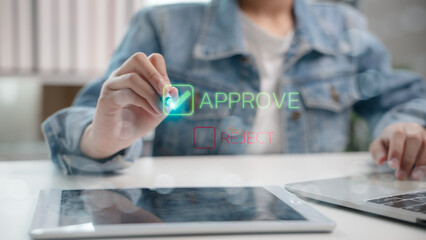 Finger tapping virtual approve button on digital interface with reject option. Concept of decision making, business approval process, workflow automation, and online validation system.