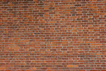 Brick wall. The texture of the red brick wall background. Textured brick wall background. Clinker...