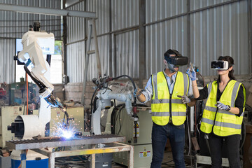 Robotic arm, Automatic robotic arm welding. Team of engineers install, maintain, repair mechanism...