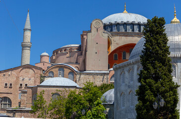 Images of historical Istanbul and the Bosphorus. The photograph includes tourists, ferries and flying birds. Hagia Sophia. Sultan Ahmet Mosque. Suleymaniye. Eminonu. Sirkeci. 