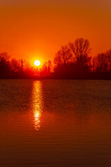 Spring sunset or sundowner view with reflections near Plattling, Isar, Deggendorf, Bavaria, Germany