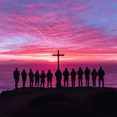 Silhouette group by the sea, cross in the sky