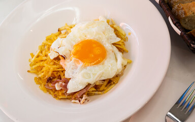 Huevo cabreado (Angre eggs) served on plate - Catalonian cuisine