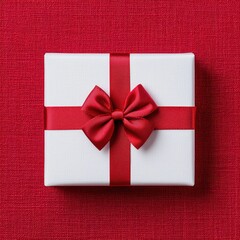 Elegant White Gift Box with Red Bow on Bright Red Background