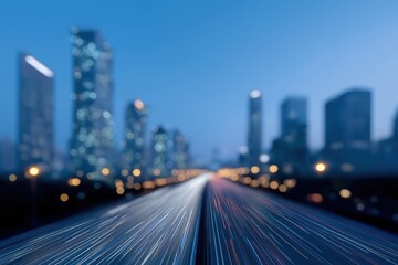 Obraz premium Blurred night cityscape with light trails on highway