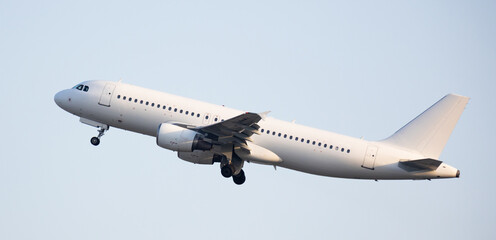 Modern passenger airliner on takeoff in the sky