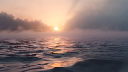 Fototapeta premium Serene Sunset Over Calm Water with Misty Horizon and Soft Colors