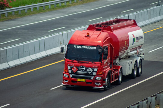 A Pertamina fuel tanker truck travels on a toll road, highlighting logistics and transportation. Suitable for articles on transportation and logistics. Indonesia, 31 October 2024