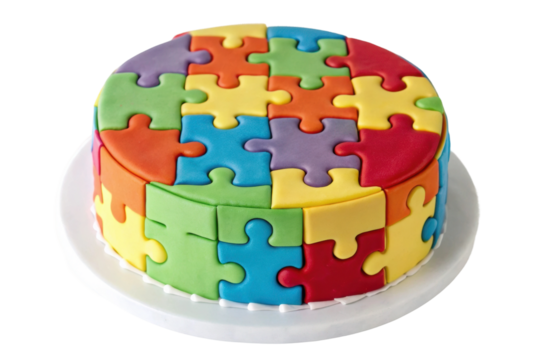 PNG Colorful puzzle piece cake with multicolored fondant on white plate