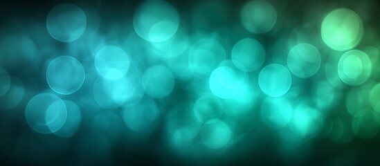 Teal and aqua bokeh lights blur a background.