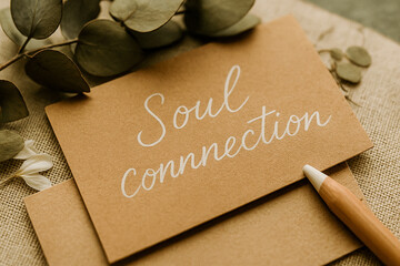 Minimalist “Soul Connection” Handwritten on Kraft Paper with Pencil and Eucalyptus