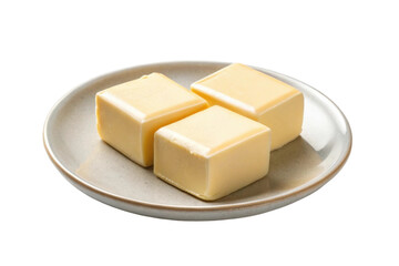 PNG Three cubes of butter on ceramic plate