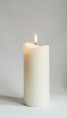 Solitary white candle, softly lit, clean white backdrop, bright, warmth