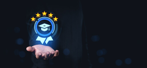 Hand holding five-star education badge symbol in glowing digital style on dark background.