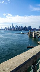 Fototapeta premium City skyline viewed from a bridge over a river or bay landscape