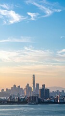 Fototapeta premium Calm Skyline View of a Serene City with Blue Sky and Soft Clouds